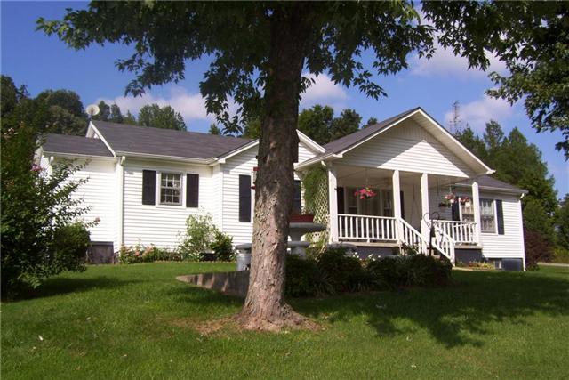 4580 Shannon Creek Road Goodspring, TN 38460 - Photo 22 of 25 a front view of a house with a garden