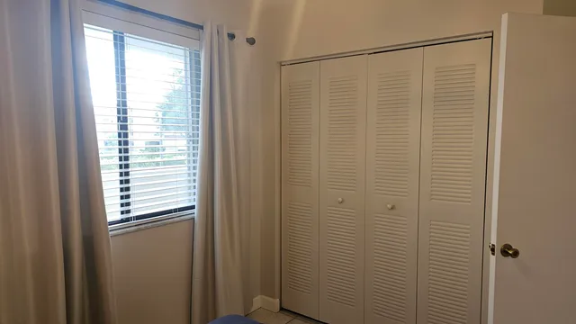 a kitchen with stainless steel appliances granite countertop a sink and a stove
