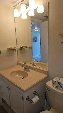 a room with furniture and flat screen tv