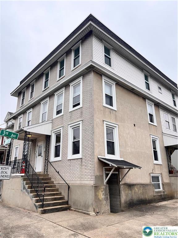 402 Prospect Avenue, Unit E3 Bethlehem, PA 18018 - Photo 1 of 19 a front view of a house with stairs