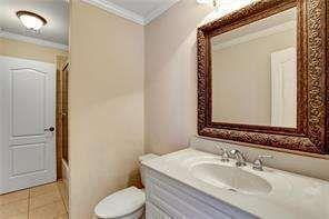 802 Pathview Court Dacula, GA 30019 - Photo 37 of 56 a bathroom with a sink toilet and mirror