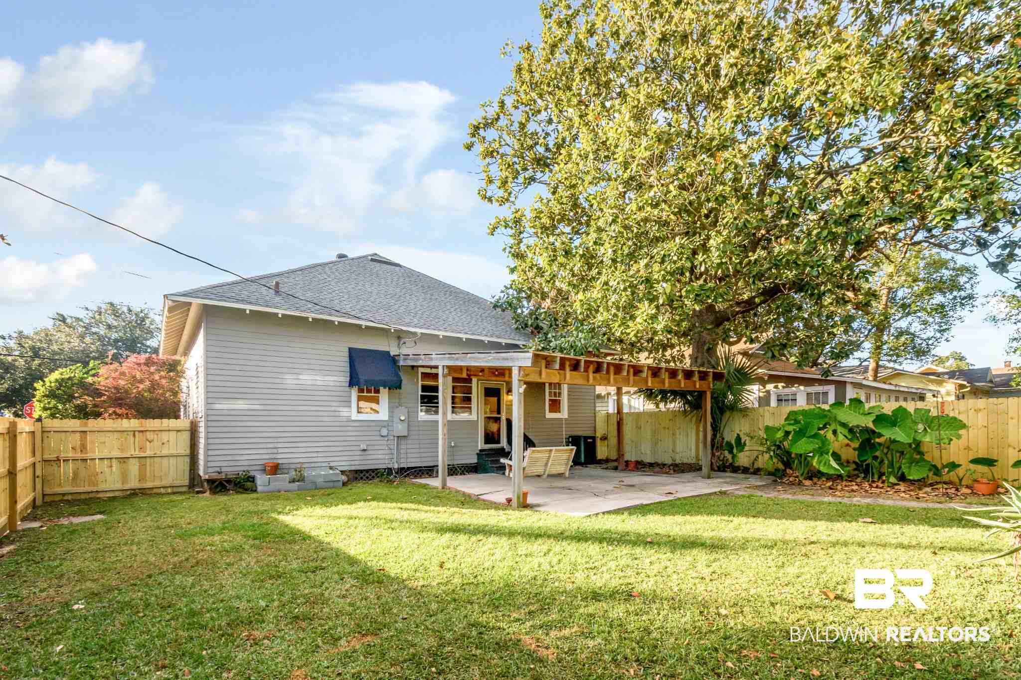 50 Semmes Avenue Mobile, AL 36604 - Photo 19 of 23 Covered patio and large fenced yard