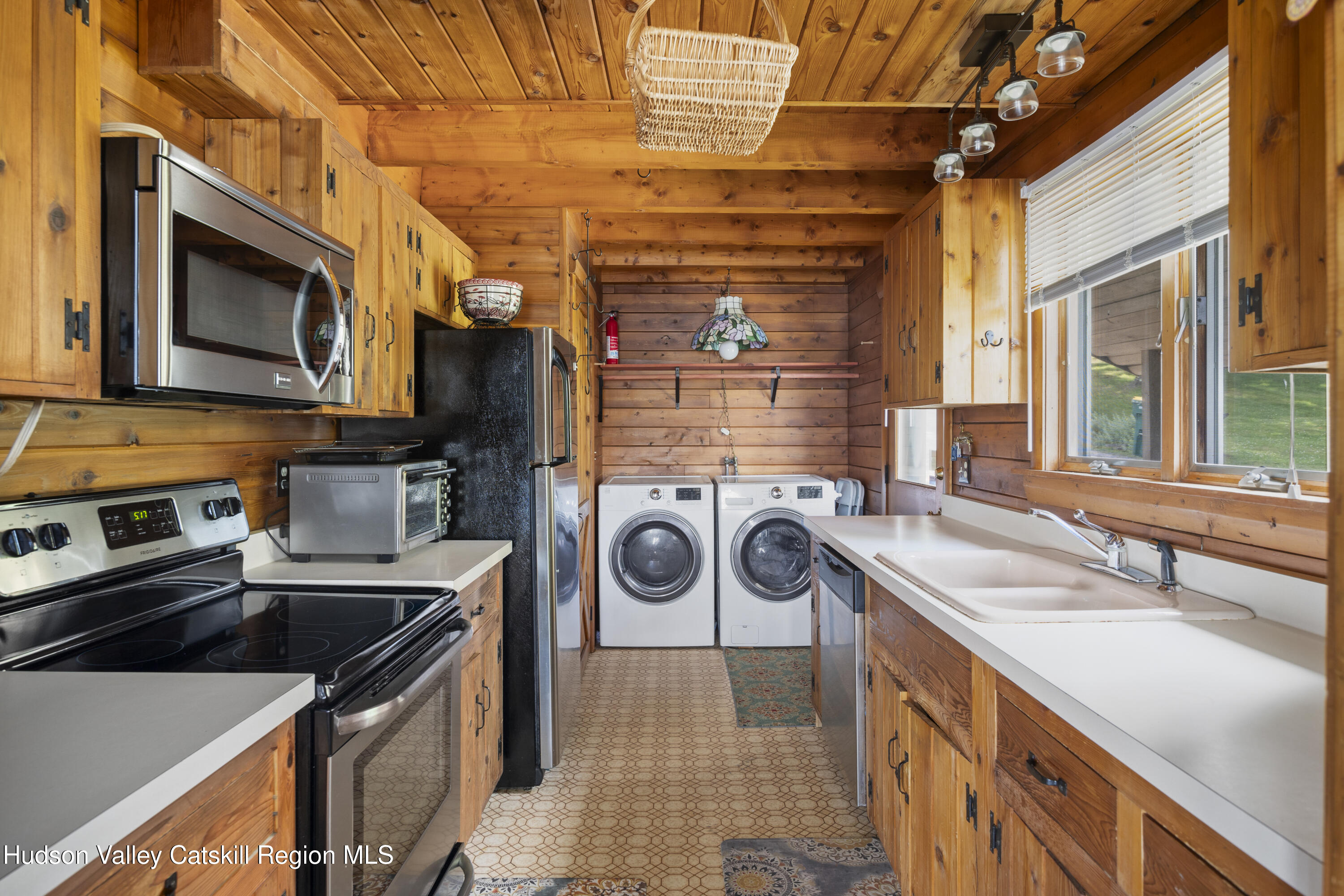 407 Lakeview Road Craryville, NY 12521 - Photo 11 of 24 a utility room with dryer and washer