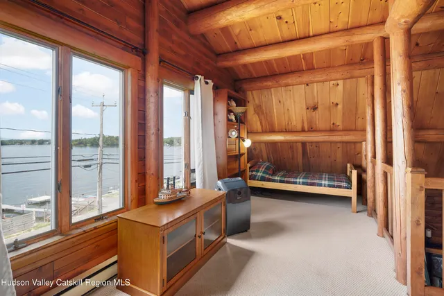 a view of a chairs and table in the balcony