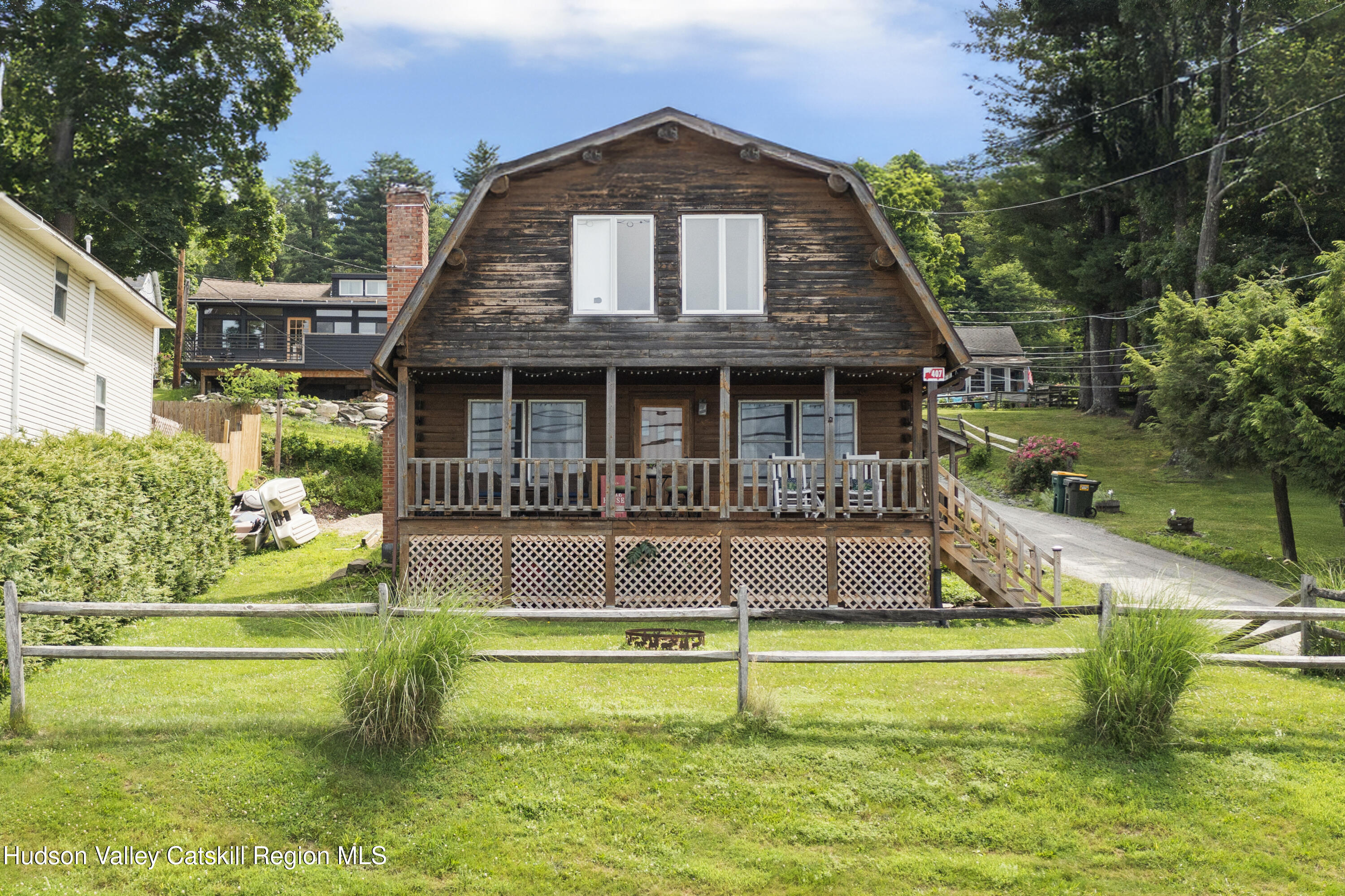 407 Lakeview Road Craryville, NY 12521 - Photo 3 of 24 a view of a house with a yard