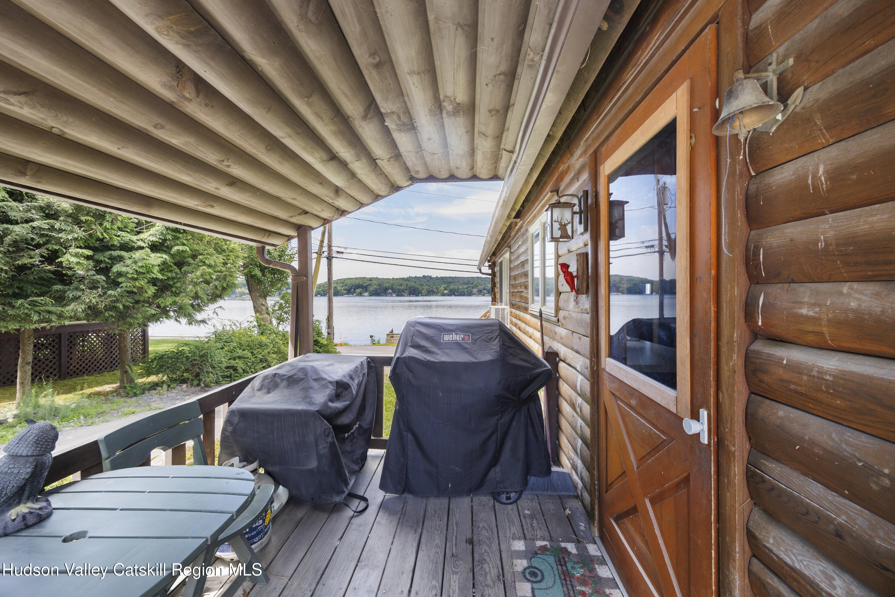 407 Lakeview Road Craryville, NY 12521 - Photo 4 of 24 a view of balcony with furniture and wooden deck