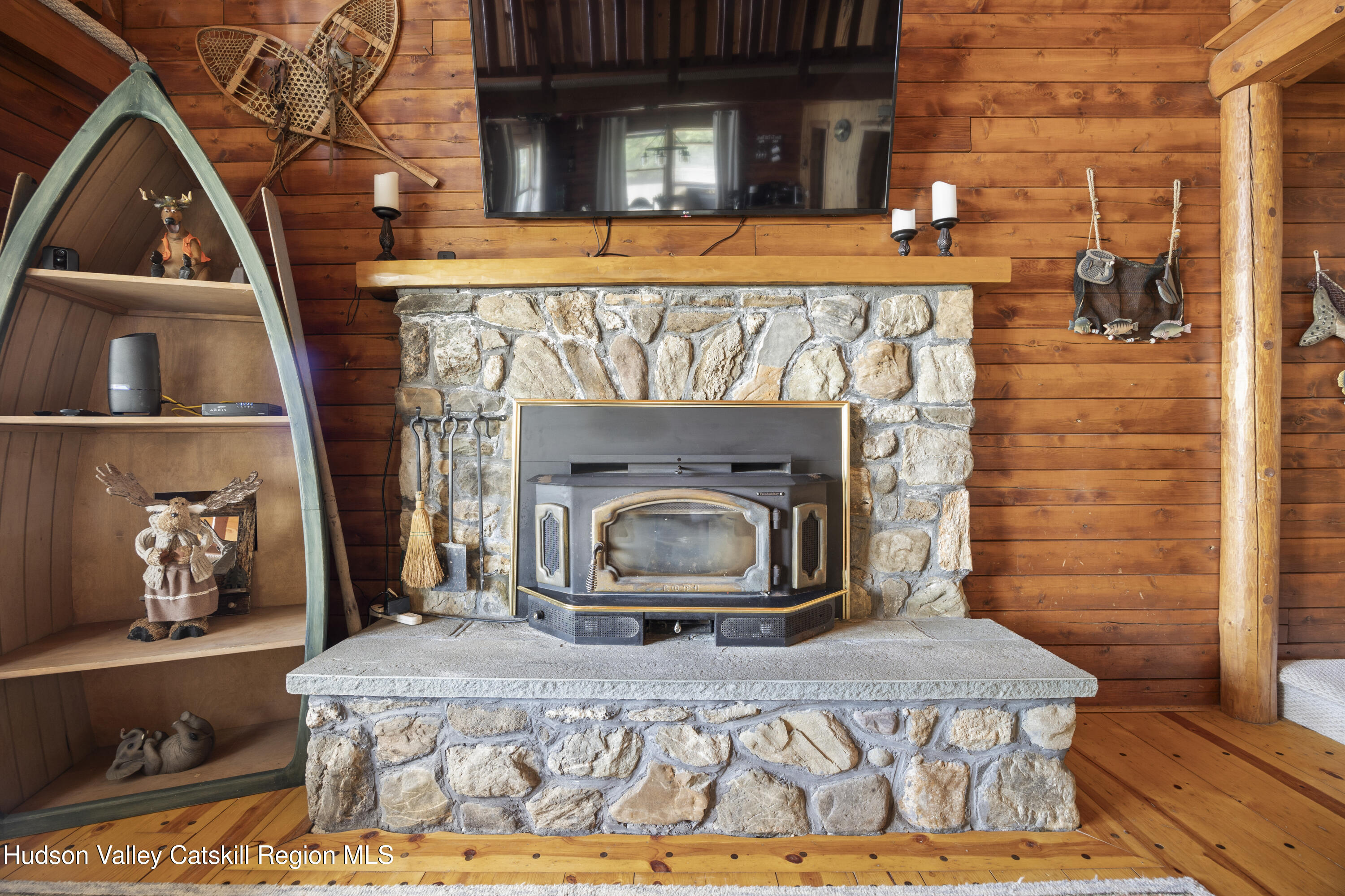 407 Lakeview Road Craryville, NY 12521 - Photo 9 of 24 a living room with a fireplace