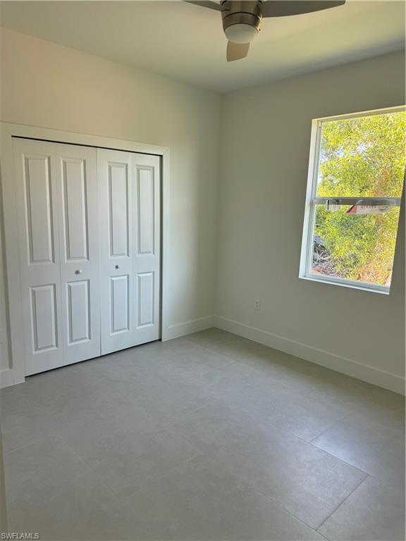 829 Albert Avenue Lehigh Acres, FL 33971 - Photo 13 of 27 an empty room with a window