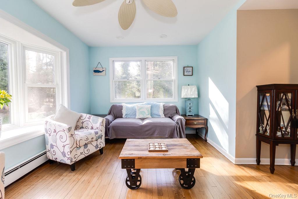 4 Conscience Bay Road Setauket, NY 11733 - Photo 12 of 26 Cozy den with hardwood floors