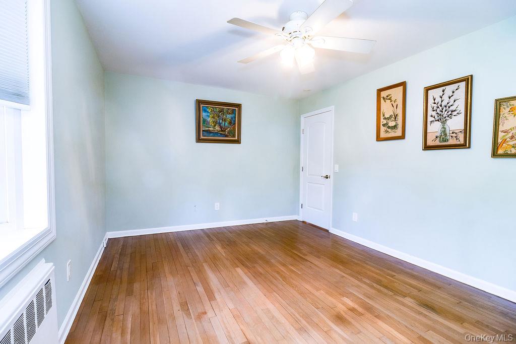4 Conscience Bay Road Setauket, NY 11733 - Photo 15 of 26 First floor bedroom with large bay window