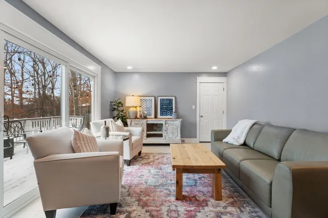 a bathroom with a sink toilet and a mirror