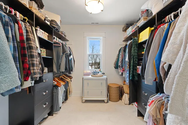 a bed room with a bed and a couch