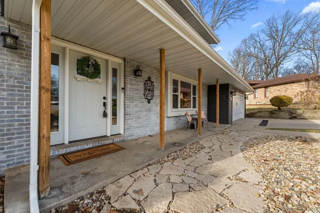 a aerial view of a house with a ocean view