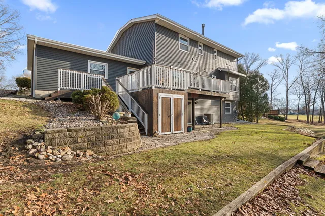 a view of livingroom with furniture and workspace