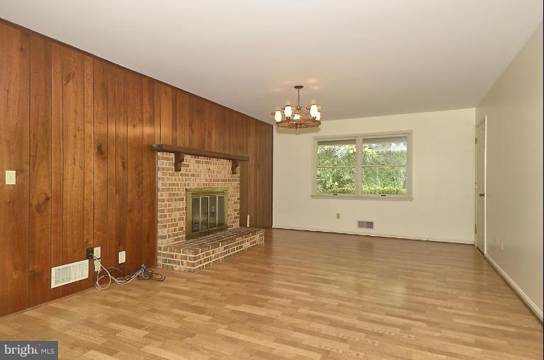 7483 Pindell School Road Fulton, MD 20759 - Photo 14 of 29 Family Room w/ brick fireplace