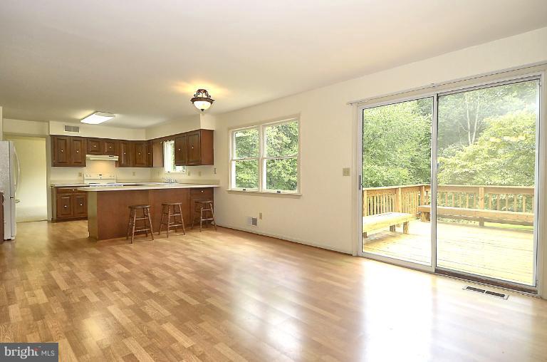 7483 Pindell School Road Fulton, MD 20759 - Photo 4 of 29 Breakfast room open to family room exit to deck