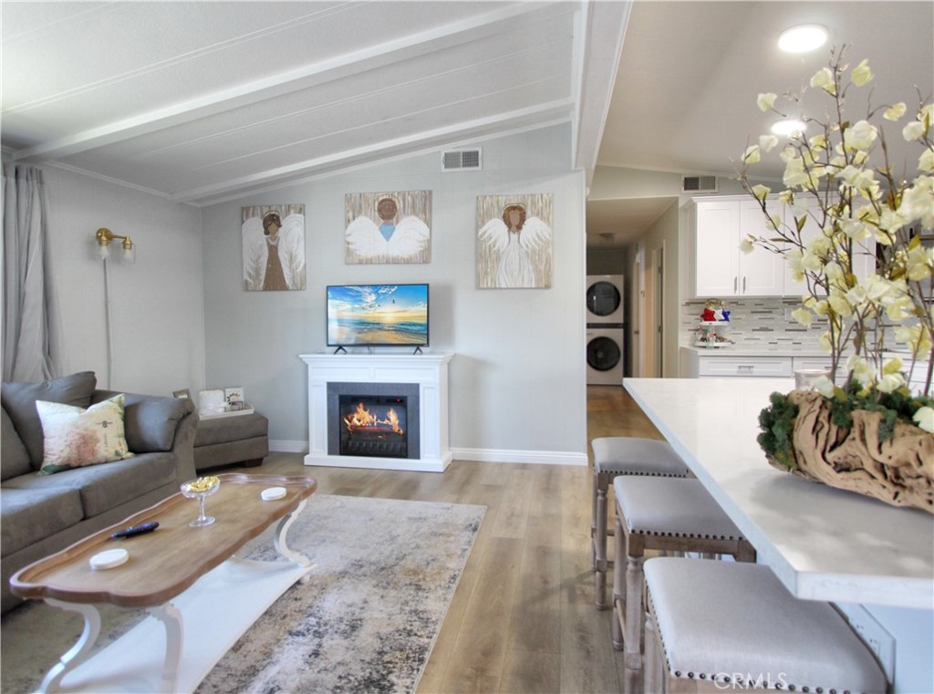 692 North Adele Street, Unit 101 Orange, CA 92867 - Photo 12 of 20 a living room with furniture and a fireplace