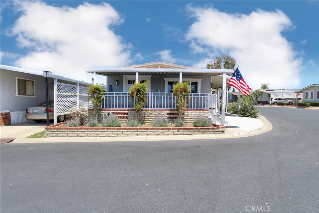 692 North Adele Street, Unit 101 Orange, CA 92867 - Photo 2 of 20 a front view of house with yard
