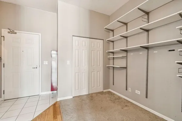 a view of an empty walk in closet