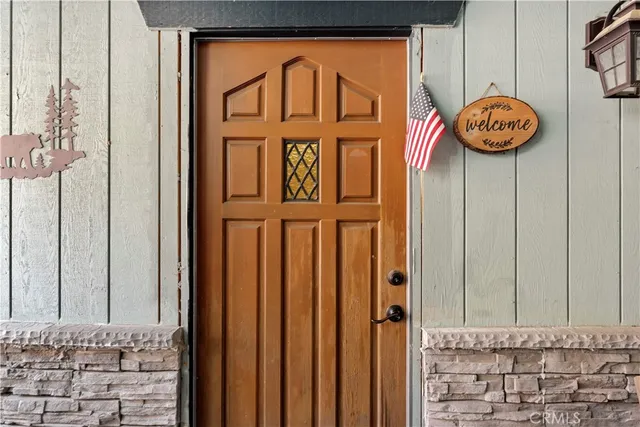 a living room with furniture a washer and dryer