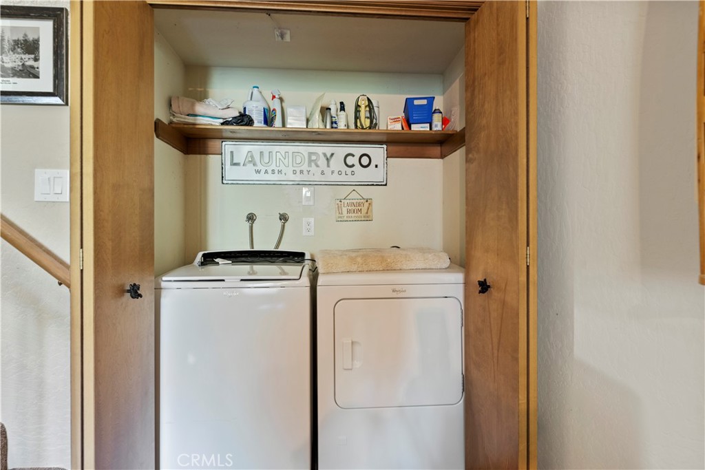 615 Wellesley Lake Arrowhead, CA 92352 - Photo 23 of 45 a utility room with dryer and washer