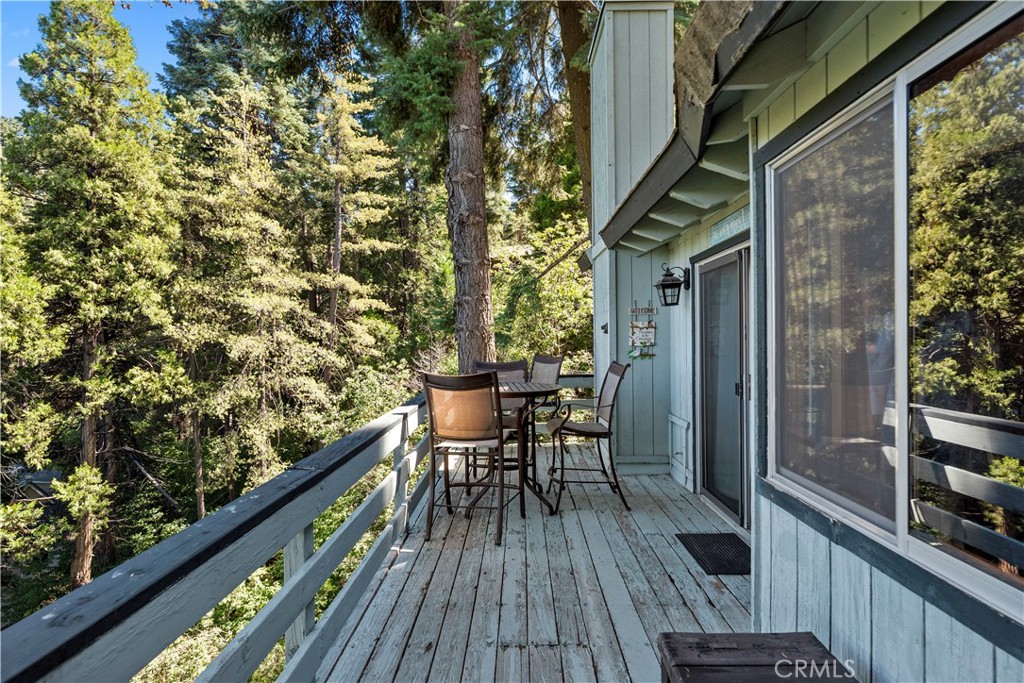615 Wellesley Lake Arrowhead, CA 92352 - Photo 31 of 45 a view of balcony with furniture and wooden deck