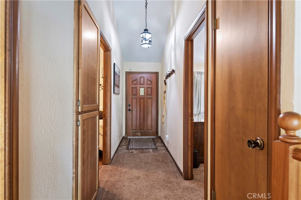 615 Wellesley Lake Arrowhead, CA 92352 - Photo 4 of 45 a view of a hallway with a elevator