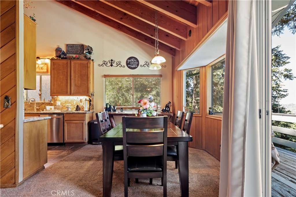615 Wellesley Lake Arrowhead, CA 92352 - Photo 8 of 45 a dining room with furniture and window