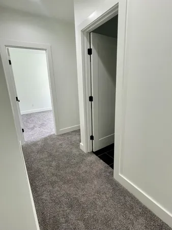 an empty room with a mirror
