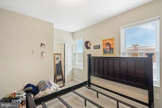 a view of empty room with wooden walls