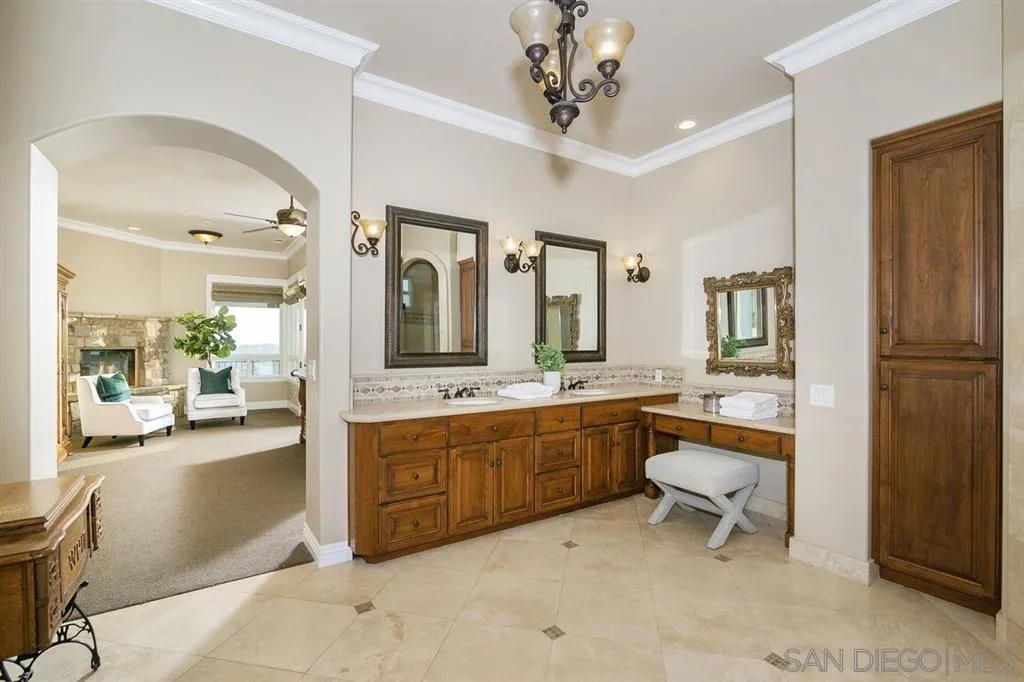 9443 Sunset Avenue La Mesa, CA 91941 - Photo 14 of 25 a spacious bathroom with a granite countertop sink mirror and bathtub