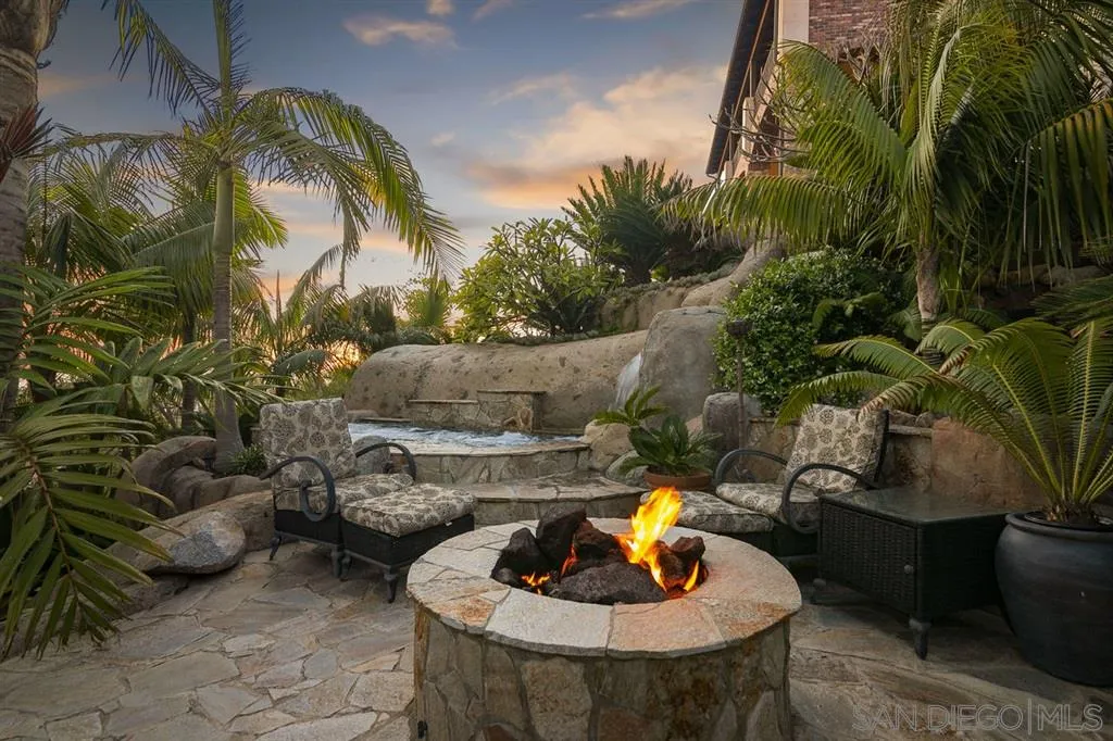 9443 Sunset Avenue La Mesa, CA 91941 - Photo 18 of 25 a view of a swimming pool with some plants and trees
