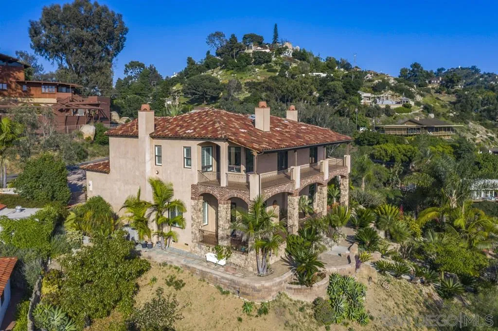9443 Sunset Avenue La Mesa, CA 91941 - Photo 2 of 25 a view of a yard with plants and a fountain