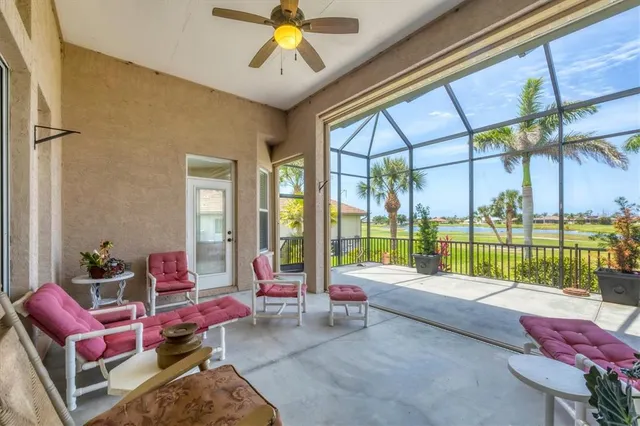 a bedroom with furniture and a chandelier