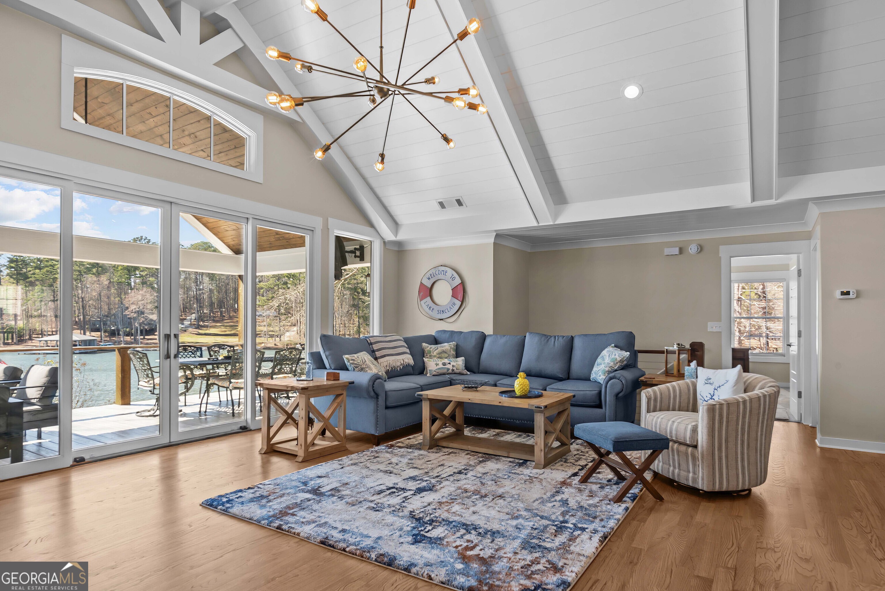 766 South Steel Bridge Road Eatonton, GA 31024 - Photo 12 of 71 a living room with furniture and a large window