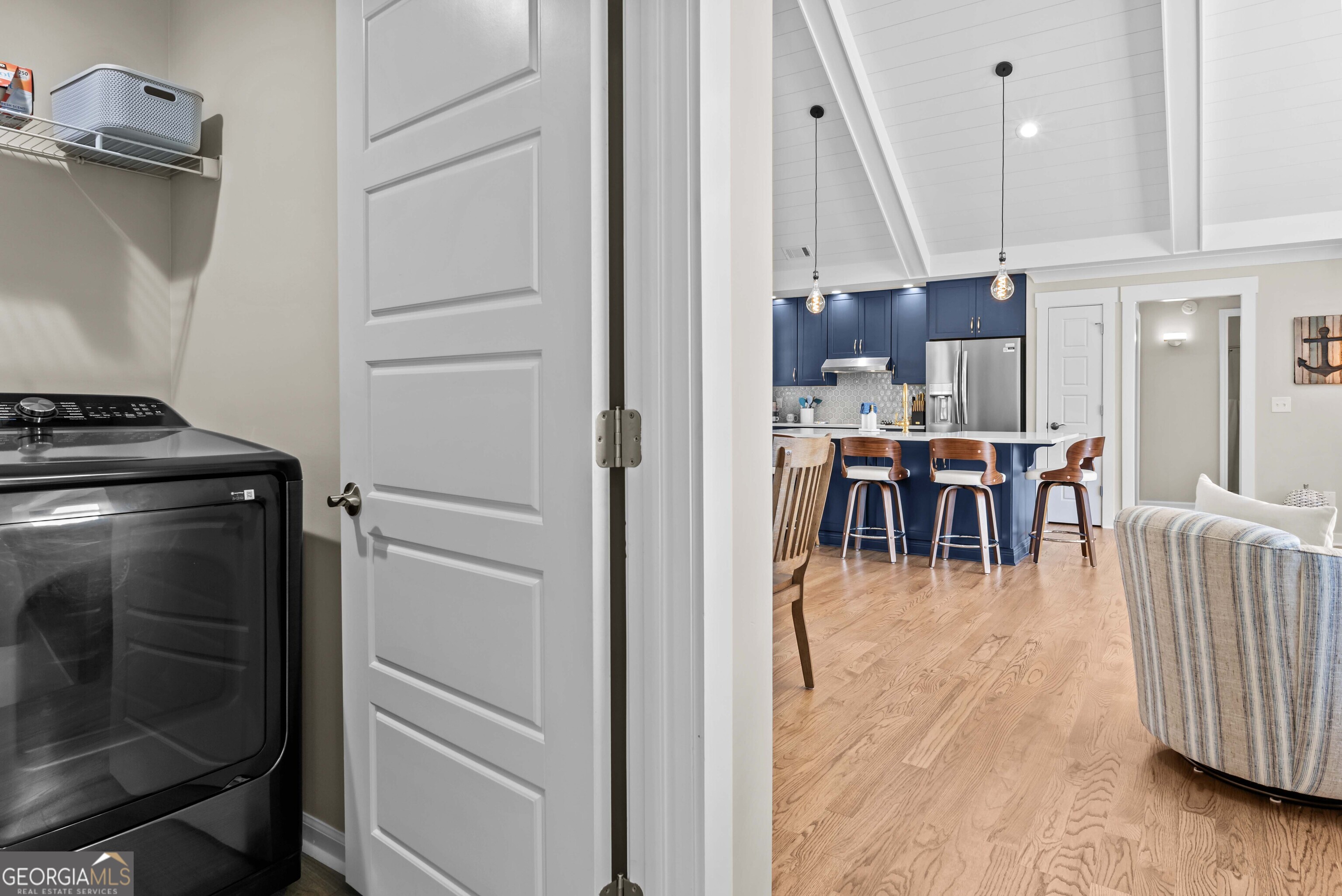 766 South Steel Bridge Road Eatonton, GA 31024 - Photo 38 of 71 a view of a dining area with furniture window and wooden floor