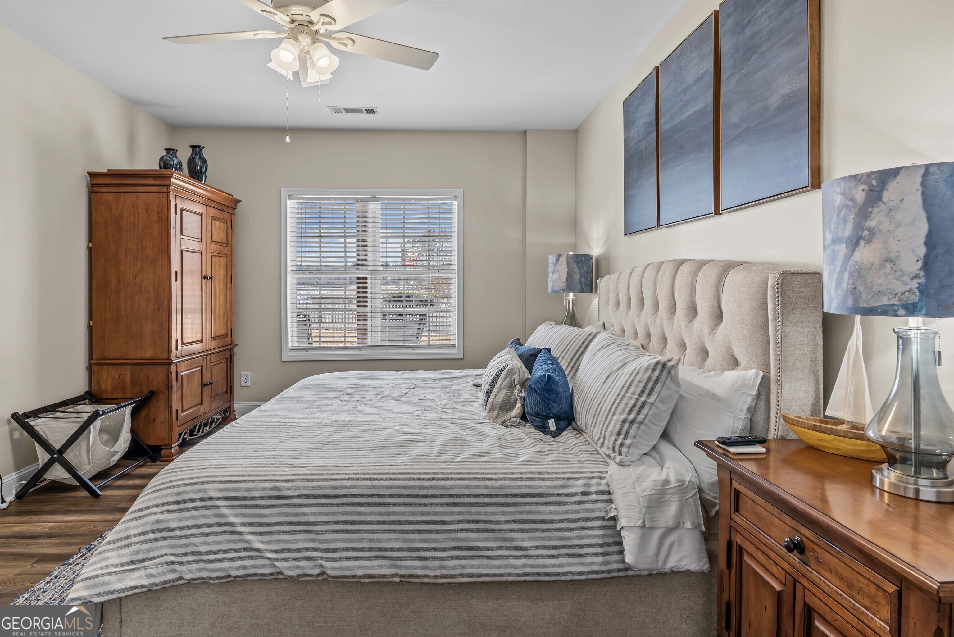 766 South Steel Bridge Road Eatonton, GA 31024 - Photo 51 of 71 a bedroom with a bed and a window