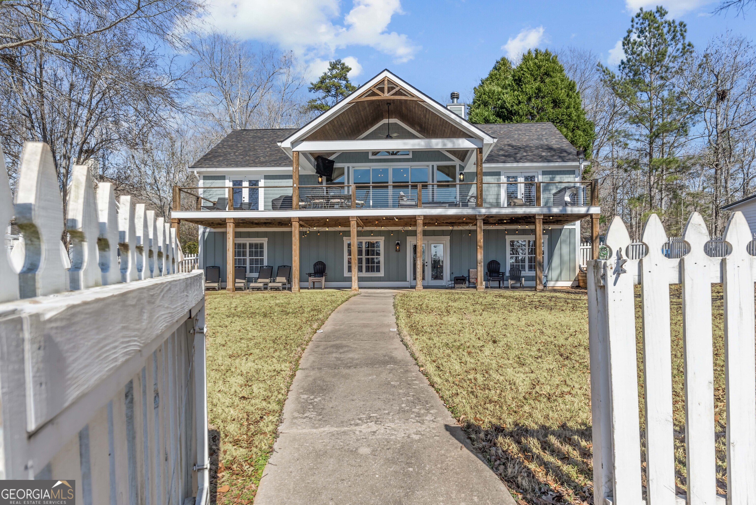 766 South Steel Bridge Road Eatonton, GA 31024 - Photo 58 of 71 a front view of a house with a yard