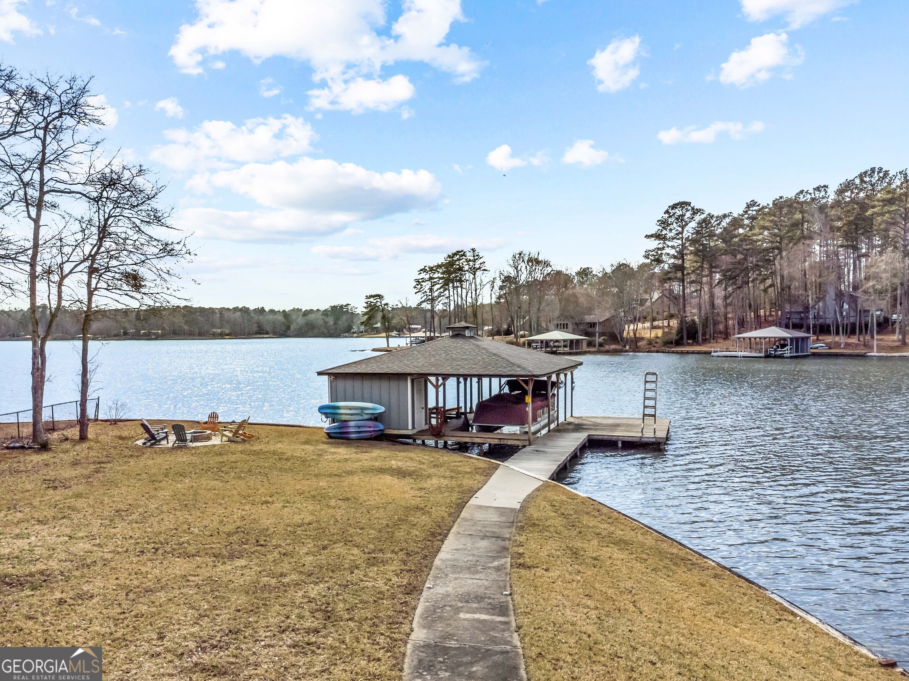 766 South Steel Bridge Road Eatonton, GA 31024 - Photo 63 of 71 a view of a lake with houses