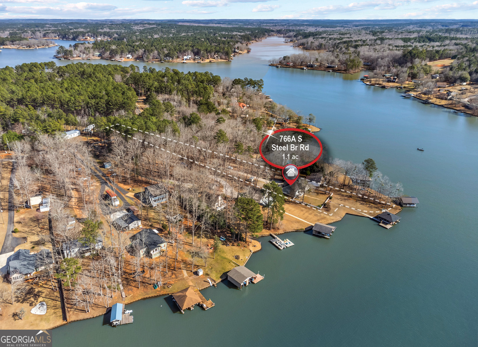 766 South Steel Bridge Road Eatonton, GA 31024 - Photo 69 of 71 an aerial view of a house with a lake view