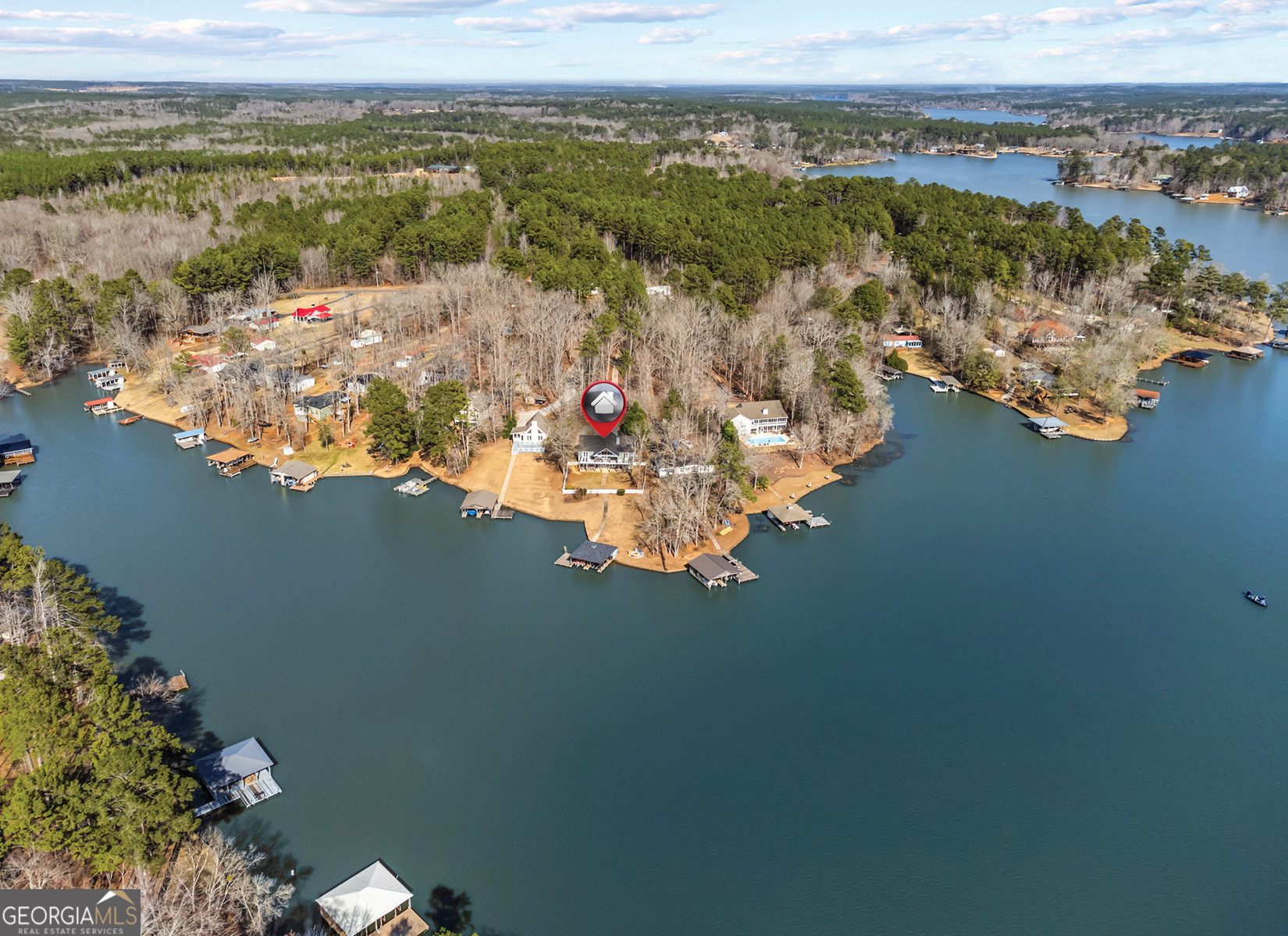 766 South Steel Bridge Road Eatonton, GA 31024 - Photo 70 of 71 an aerial view of a house with a lake view