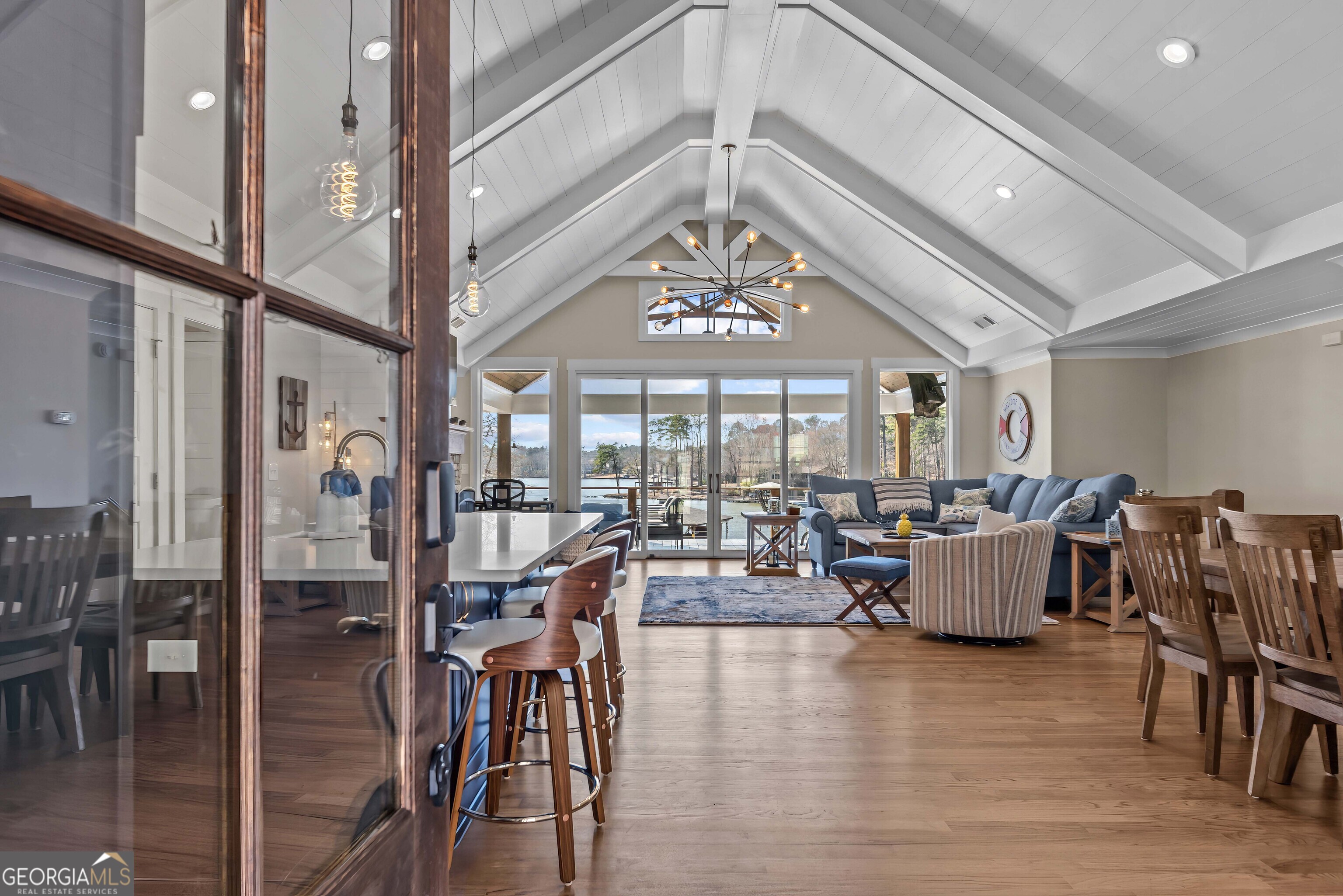 766 South Steel Bridge Road Eatonton, GA 31024 - Photo 9 of 71 a view of a dining room with furniture window and wooden floor