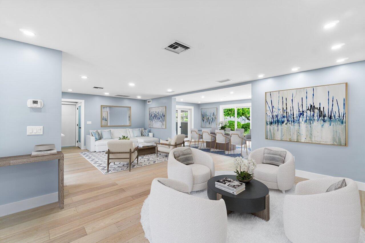 1317 Southwest 9th Street Boca Raton, FL 33486 - Photo 1 of 41 a living room with furniture and a wooden floor