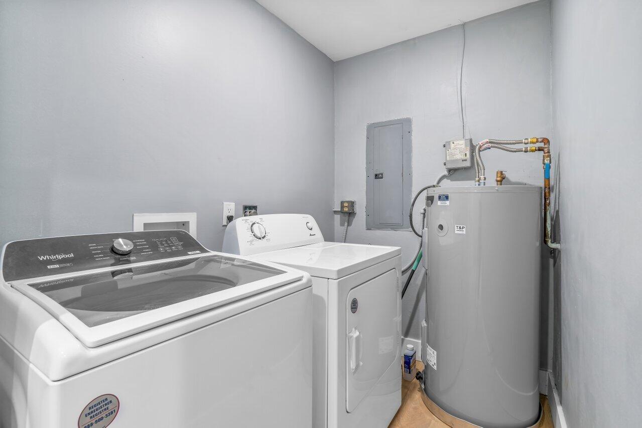1317 Southwest 9th Street Boca Raton, FL 33486 - Photo 27 of 41 a utility room with dryer and washer