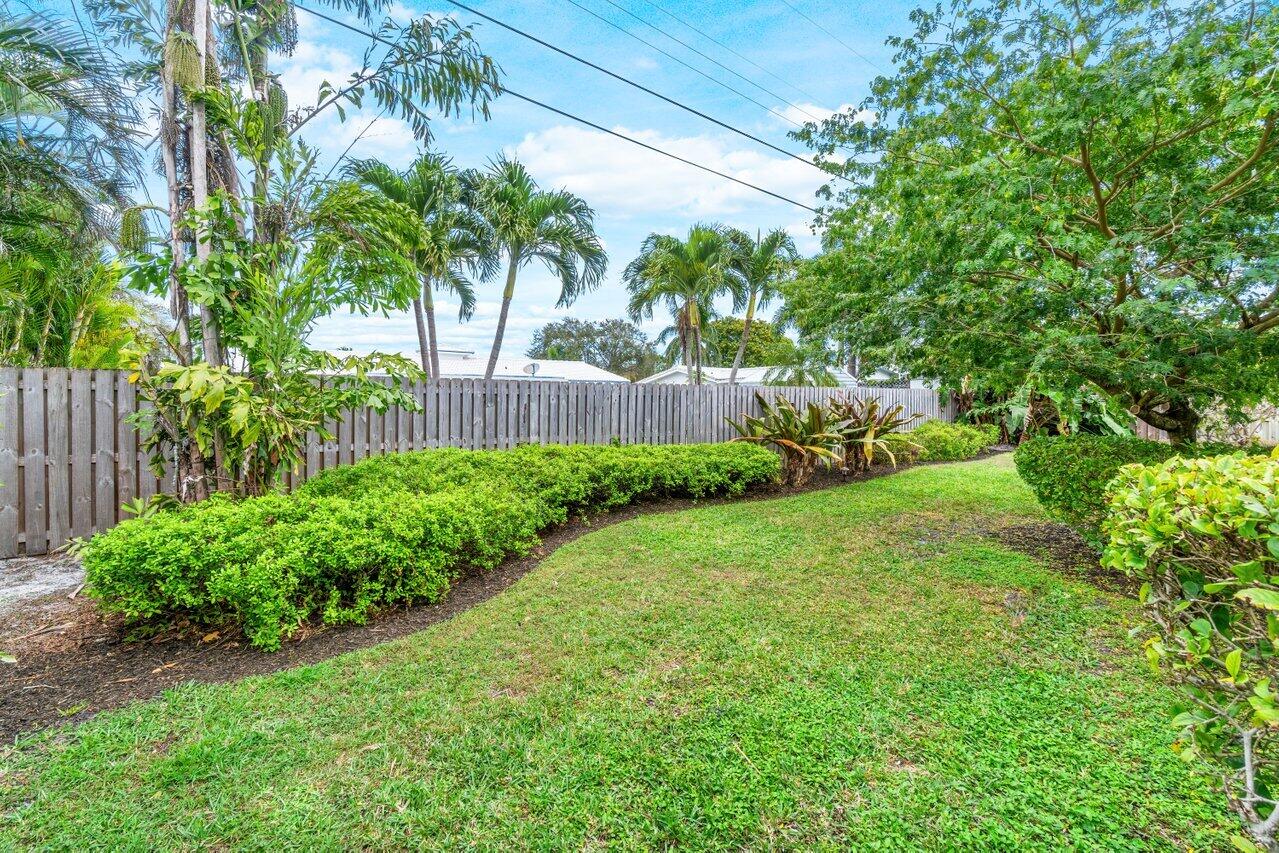 1317 Southwest 9th Street Boca Raton, FL 33486 - Photo 28 of 41 a view of a garden with a tree