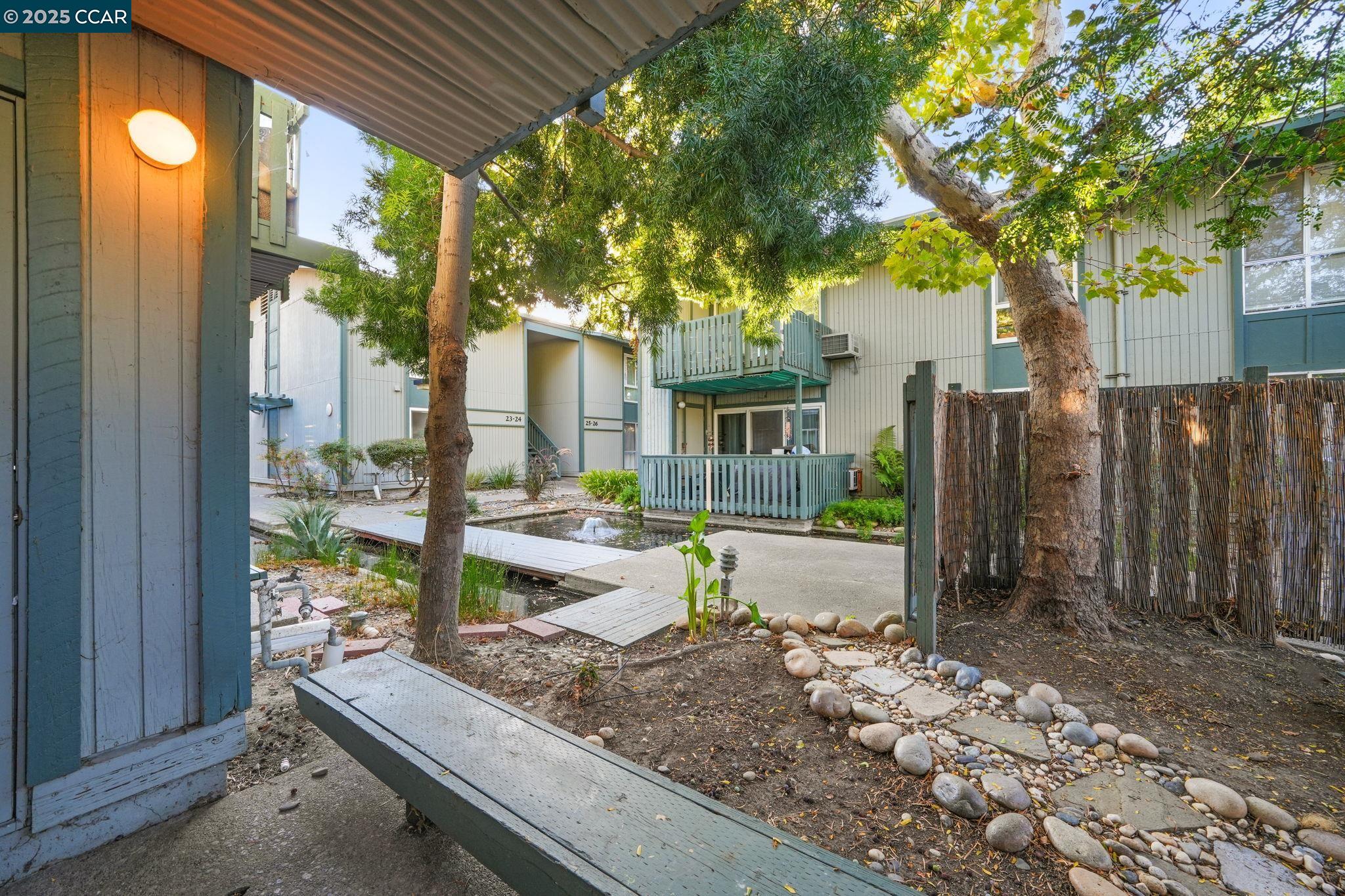 1036 Oak Grove Road, Unit 21 Concord, CA 94518 - Photo 17 of 23 a house view with a sitting space