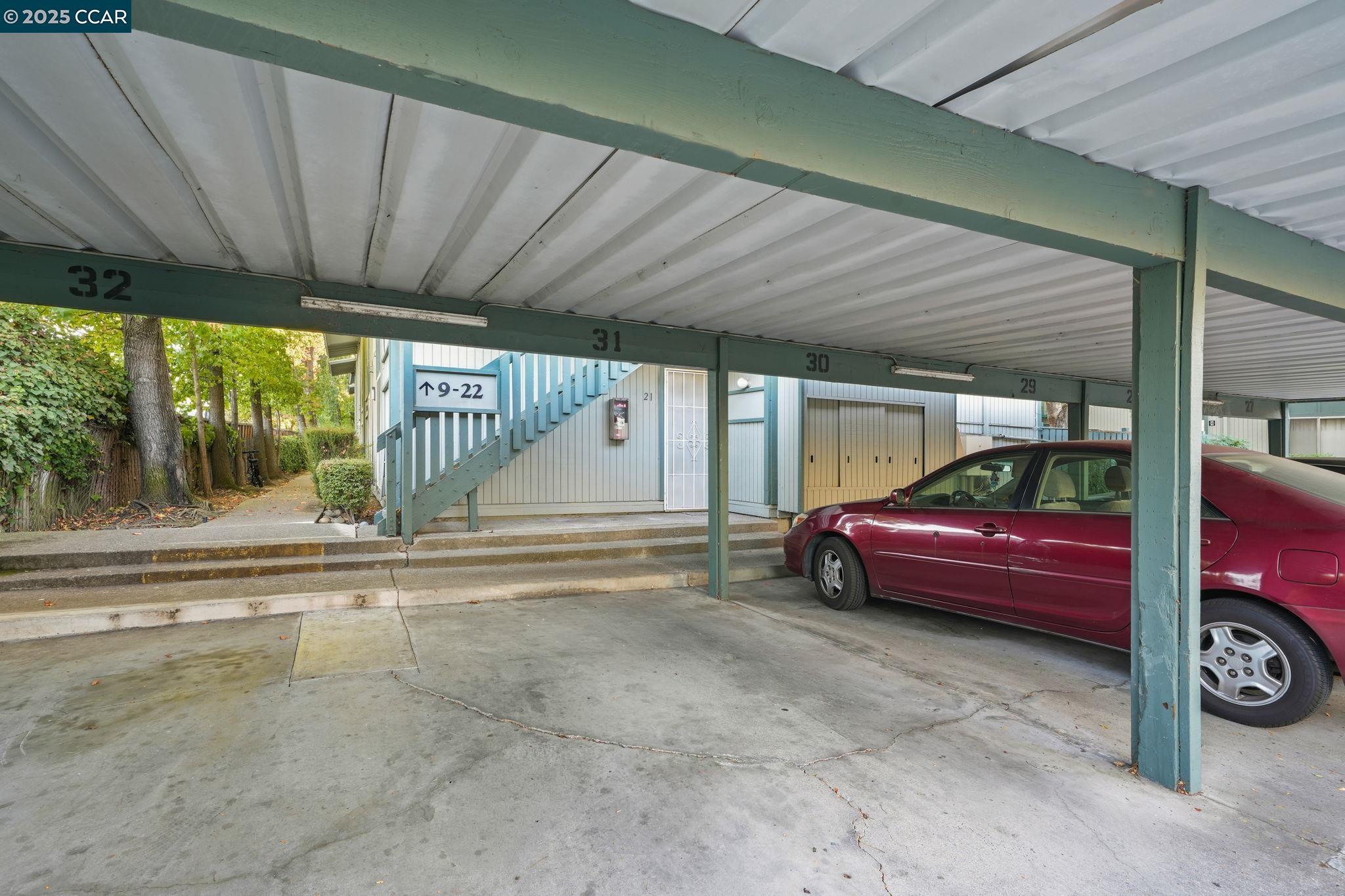 1036 Oak Grove Road, Unit 21 Concord, CA 94518 - Photo 21 of 23 a view of a car garage