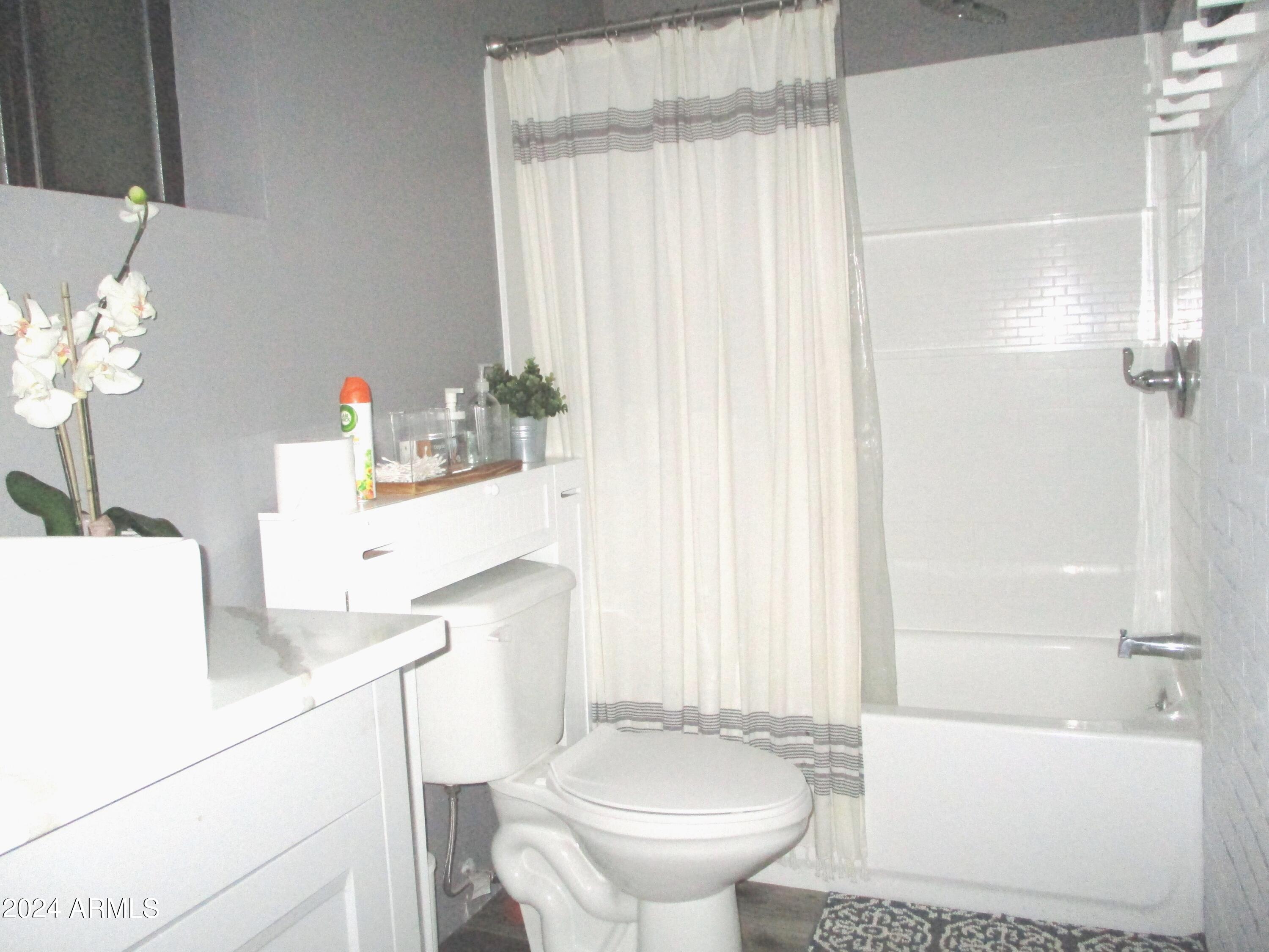 8539 Buffalo Road Strawberry, AZ 85544 - Photo 7 of 19 a bathroom with a sink a toilet and shower