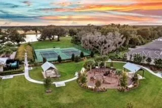 a view of a lake with a yard