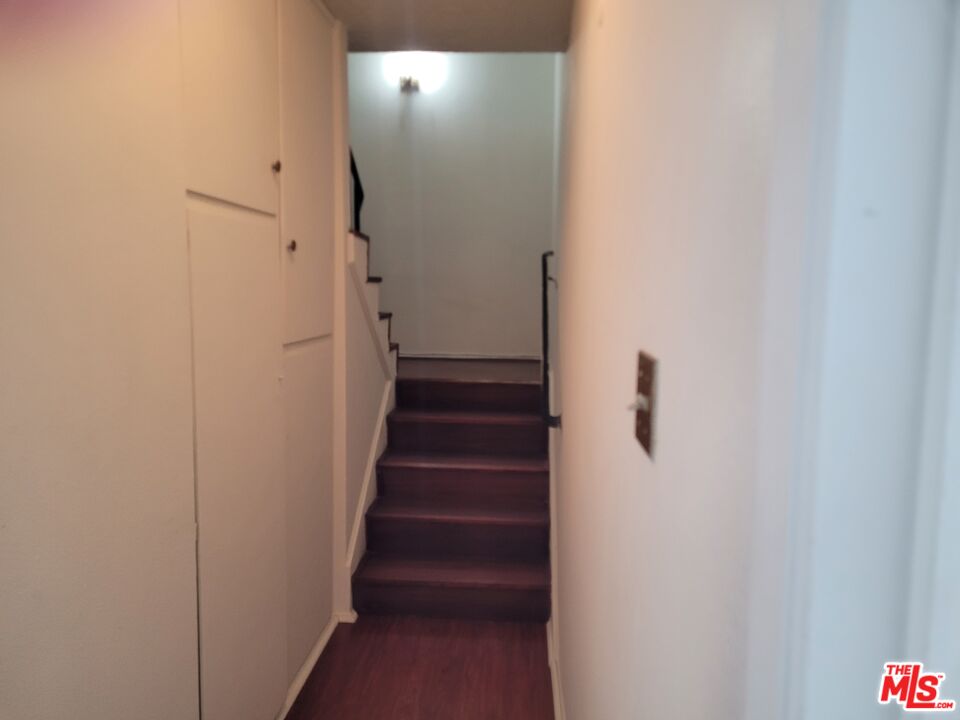 7 Scottsdale Drive Carson, CA 90745 - Photo 7 of 13 a view of a hallway with stairs